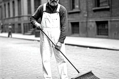 Un balayeur en 1930 avec son gros balai